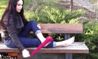 Diane luscious locks cascade as she boldly displays feet